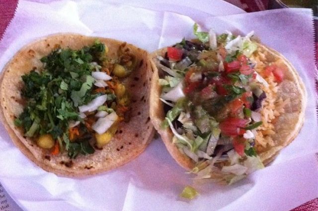 I can't vouch for them, but squash blossom and vegetarian tacos look like a pretty good option.